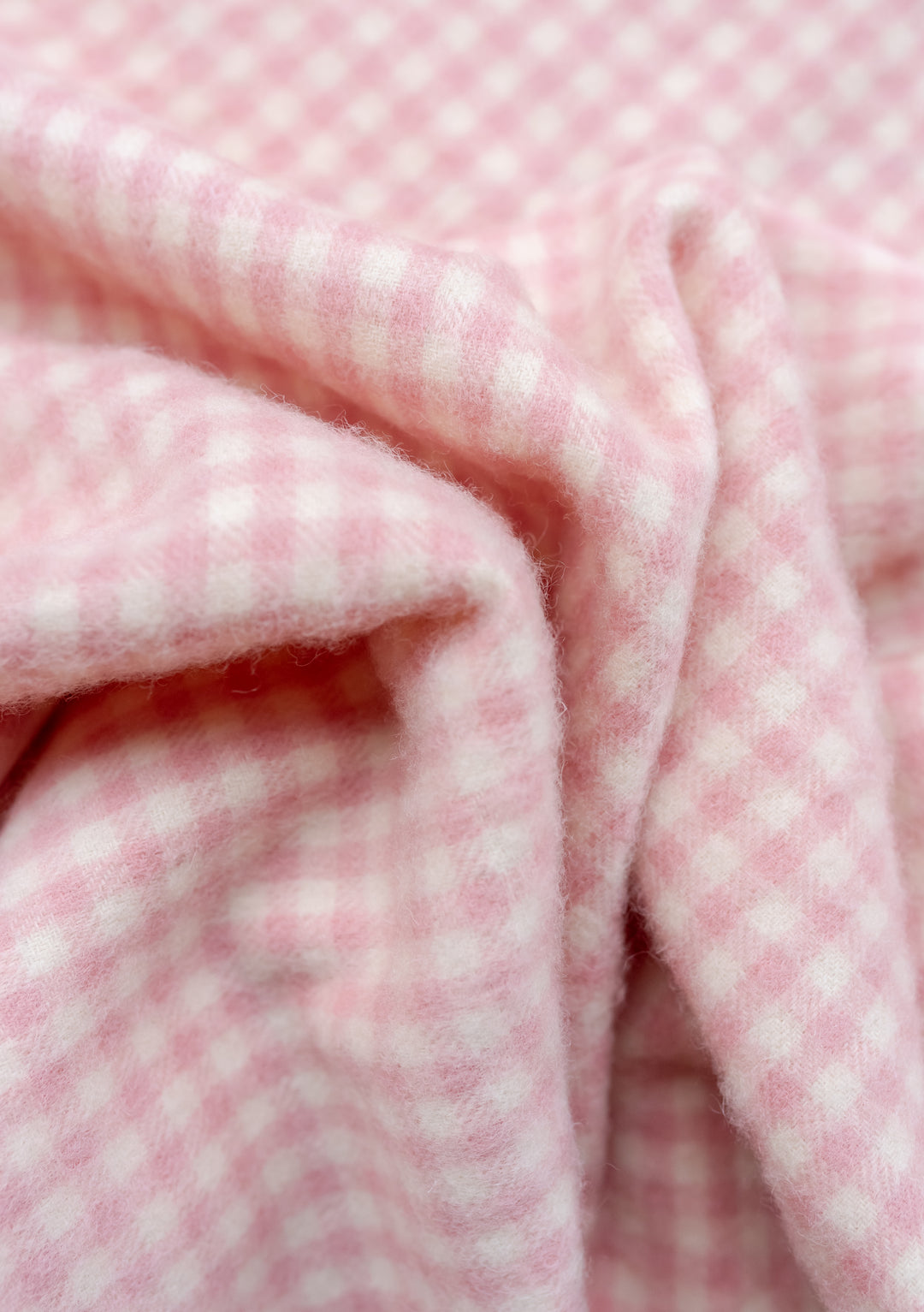 Babydecke aus Lammwolle in Rosa mit Gingham-Muster