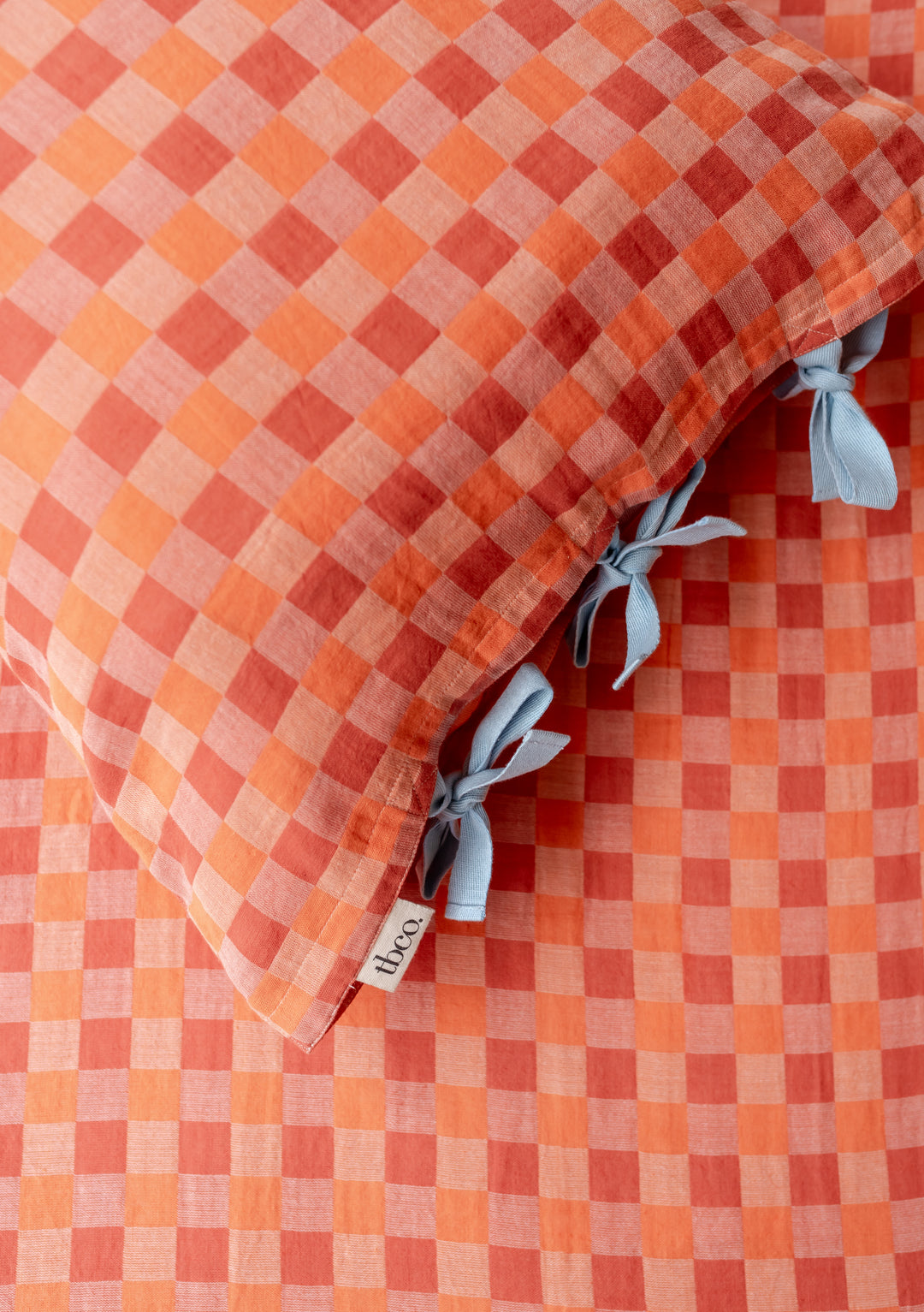 Pair of Cotton Pillowcases in Apricot Checkerboard